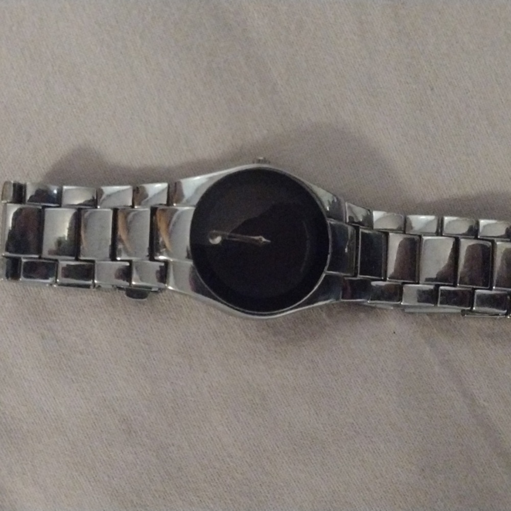 I have here a very nice Movado mens watch